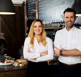 Successful restaurant managers standing together